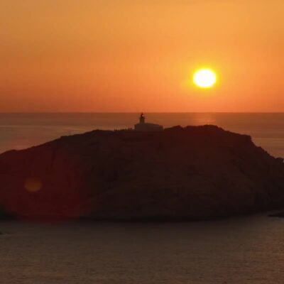 Phare de La Pietra au coucher de soleil L'Ile-Rousse