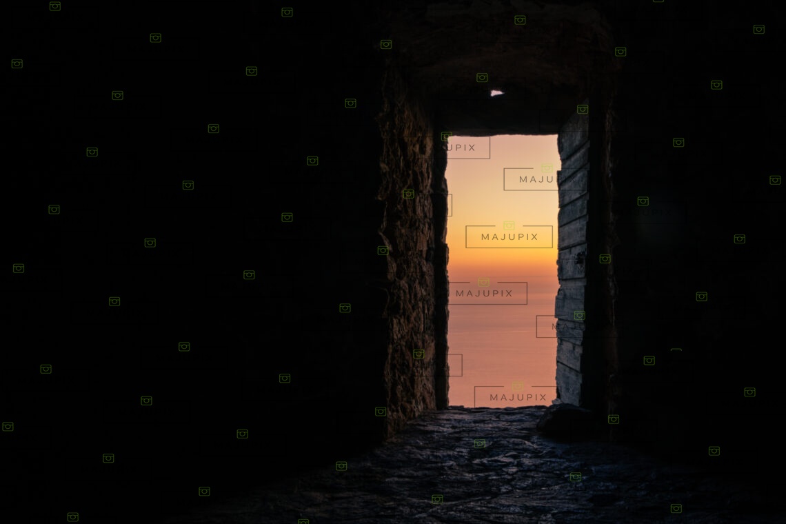 Tour génoise de Capo Rosso au coucher de soleil