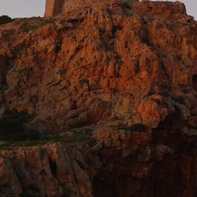 Tour génoise de Capo Rosso au coucher de soleil