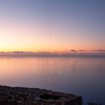 Tour génoise de Capo Rosso au coucher de soleil drone