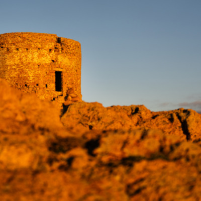 Tour génoise de Capo Rosso au coucher de soleil