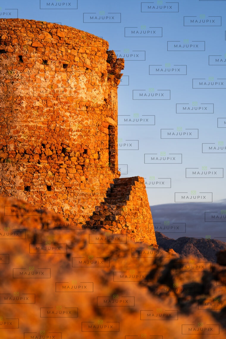 Tour génoise de Capo Rosso au coucher de soleil