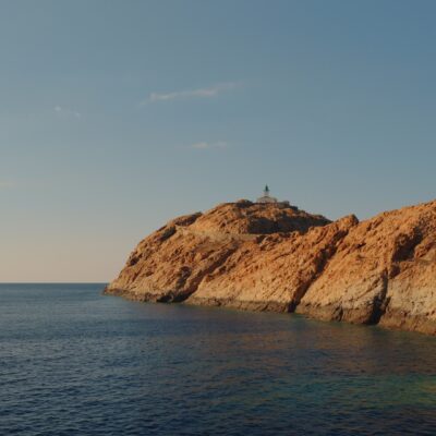 Phare de La Pietra au coucher de soleil  l'Ile-Rousse
