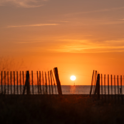 Lever de soleil sur la plage de l'Arinella